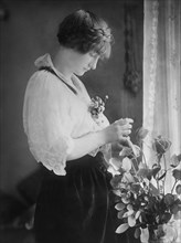 Elizabeth Harrison Walker (1897-1955), Daughter of U.S. President Benjamin Harrison, Married James Blaine Walker, Three-Quarter Length Portrait with Vase of Roses, Bain News Service, 1921