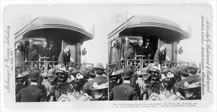 President McKinley Shaking hands from rear platform; Sec. Wilson, Sec. Hitchcock and Sec. Cortelyou with him, Alliance, Ohio, Stereo Card, Underwood & Underwood, 1900