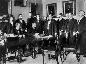 U.S. President William McKinley Looks on as Peace Protocol is Signed by French Ambassador Pierre Paul Cambon, Leading to the end of the Spanish-American War, Washington DC, USA, Francis Benjamin Johns...