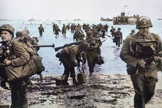 American Assault Troops with Full Equipment Move onto a Beachhead in Northern France, by Wall, U.S. Signal Corps, June 7, 1944