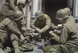 U.S. Army Soldiers eating from Mess Kits, Normandy, France, June 1944