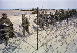 Captured German Soldiers Kept in Barbed Wire Enclosure on Beach during Invasion of Normandy, France, June 1944