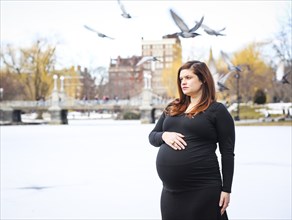 Pregnant Woman Portrait, Birds Flying Overhead, Boston Public Garden, Boston, Massachusetts, USA