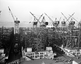 Liberty Ship Frederick Douglass in its early stage of Construction, Bethlehem-Fairfield Shipyards, Baltimore, Maryland, USA, Roger Smith, U.S. Office of War Information, May 1943