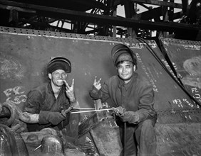 Two Electric Welders Helping to Build Liberty Ship Frederick Douglass, Bethlehem-Fairfield Shipyards, Baltimore, Maryland, USA, Roger Smith, U.S. Office of War Information, May 1943