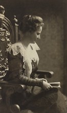 Edith Roosevelt (1861-1948), First Lady of the United States 1901-1909 as Wife of U.S. President Theodore Roosevelt, Seated Portrait holding Book, Photograph by S. Schloss, 1901
