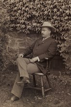 Theodore Roosevelt (1858-1919), 26th President of the United States 1901-09, Full-Length Seated Portrait as New York Governor, August 1900