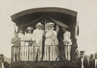 U.S. President Theodore Roosevelt, with wife and others, most dressed in white, on back of Train, at Culebra or Gaillard Cut, Panama Canal, Photograph by H.C. White Co., 1906
