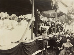 U.S. President Theodore Roosevelt Speaking to Crowd from Flag-Draped Platform during 250th Anniversary Celebration of the Town's Founding, Huntington, New York, USA, July 4, 1903