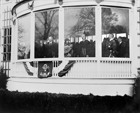 U.S. President Herbert Hoover, Mrs. Hoover and Chief Justice William Howard Taft inside Presidential Reviewing Stand during Parade for Hoover's Inauguration, Washington, D.C., USA, Photograph by Natio...