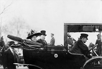 U.S. President William Howard Taft and his wife, First Lady Helen Herron Taft, Seated in back of White House Convertible Automobile with Roof Down, Washington, D.C., USA, Photograph by Barnett McFee C...
