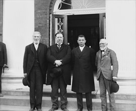 (Left to right) Robert C. Ogden, U.S. Secretary of War William Howard Taft, Booker T. Washington and Andrew Carnegie, Standing on steps of building at Tuskegee Institute during its 25th Anniversary Ce...