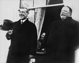U.S. President-elect Woodrow Wilson and U.S. President William Howard Taft, Standing side by side, Laughing,  prior to Wilson's Inauguration Ceremonies, White House, Washington, D.C., USA, March 4, 19...