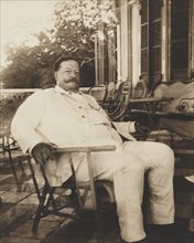 William H. Taft, seated in a wicker chair, while Heading up the 2nd Philippine Commission (aka Taft Commission), Manila, Philippines, early 1900's