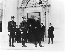 U.S. President Woodrow Wilson Standing with Two Military Aides at White House Entrance, Washington, D.C., USA, Photograph by Herbert E. French, National Photo Company, 1913