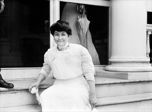 Ellen Axson Wilson (1860-1914), First Wife of U.S. President Woodrow Wilson, who died in the second year of Wilson's Presidency, Half-length Portrait Standing on Porch Steps of Summer Residence, Sea G...