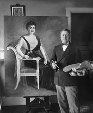 Artist Seymour M. Stone with Painting of First Lady Edith Bolling Wilson, Wife of U.S. President Woodrow Wilson, National Photo Company, 1920