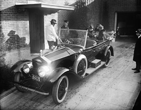 Former U.S. President Woodrow Wilson with his Second wife Edith Wilson in back of Convertible Car, Washington, D.C., USA, Harris & Ewing, 1924