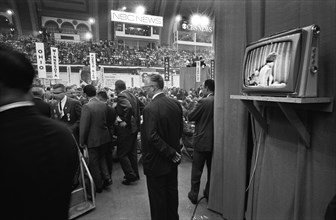 Delegates with State Signs and a Television Screen, Democratic National Convention, Boardwalk Hall, Atlantic City, New Jersey, USA, photograph by Thomas J. O'Halloran, August 1964