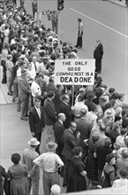Crowd gathered on Street to see Soviet Leader Nikita Khrushchev, Man holding Sign "The only Good Communist is a Dead Communist", Des Moines, Iowa, USA, photograph by Thomas J. O'Halloran, September 19...