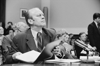 U.S. President Gerald Ford appearing at the House Judiciary Subcommittee hearing on pardoning former President Richard Nixon, Washington, D.C., USA, photograph by Thomas J. O'Halloran, October 14, 197...