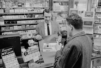 Man Buying Cartons of Cigarettes, photograph by Thomas J. O'Halloran, 1964