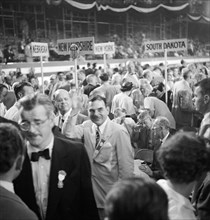 Thomas E. Dewey, Governor of New York, waving from Floor of Convention Hall during Republican National Convention, International Amphitheatre, Chicago, Illinois, USA, photograph by Thomas J. O'Hallora...