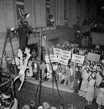 Crowd Watching Acrobat Act while Holding "Swing for Ewing Signs" for Candidate Oscar R. Ewing, Democratic National Convention, International Amphitheatre, Chicago, Illinois, USA, photograph by Thomas ...