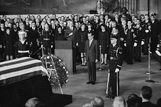 U.S. President Richard M. Nixon Standing before Flag-Draped Casket of Former U.S. President Dwight D. Eisenhower, Washington, D.C., USA, photograph  by Thomas J. O'Halloran, March 30, 1969