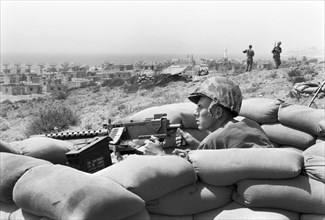 U.S. Marine aims Machine Gun from Foxhole during Lebanon Crisis, Beirut, Lebanon, photograph by Thomas J. O'Halloran, July 1958