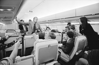 Democratic Presidential Nominee Jimmy Carter holding an informal Press Conference aboard "Peanut One" Campaign Airplane on Campaign Trip, photograph by Thomas J. O'Halloran, September 11, 1976