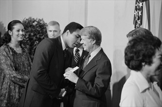 U.S. President Jimmy Carter greets Mohammed Ali at White House Dinner celebrating the signing of the Panama Canal Treaty, Washington, D.C., USA, photograph by Marion S. Trikosko, September 7, 1977