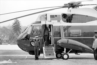 U.S. President Jimmy Carter waving goodbye as he departs the White House, Washington, D.C., for Camp David, Maryland aboard Marine One, photograph by Warren K. Leffler, January 16, 1981