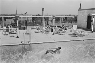 Group of Residents Enjoying Rooftop Pool at new Apartment Building "The Executive Apartments", Washington, D.C., USA, photograph by Thomas J. O'Halloran, 1962