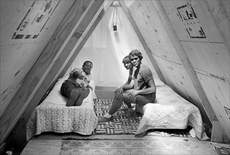 African American Family in Temporary Dwelling, Resurrection City, Washington, D.C., USA, photograph by Marion S. Trikosko, May 22, 1968