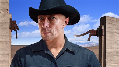 Head and Shoulders Portrait of Man in Cowboy Hat against Desert Background