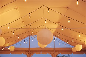 Lights and Paper Lanterns in Wedding Tent