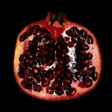 Sliced Pomegranate on Black Background