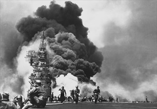 U.S. Aircraft Carrier USS Bunker Hill burning
