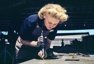 Female War Production Worker working in the Assembly and Repair Department