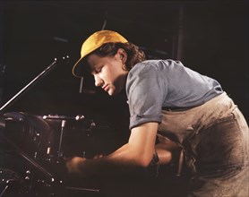 Lathe Operator machining Parts for Transport Planes