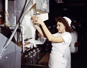 Female War Production Worker with Transfusion Donor Bottles