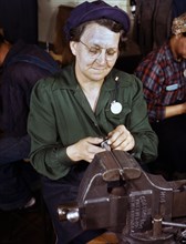 Female War Production Worker doing Bench Work on Small Gun Parts for M5 and M7 Guns for U.S. Army