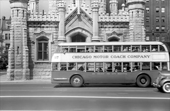 Double Decker Bus in front of Chicago Water Tower
