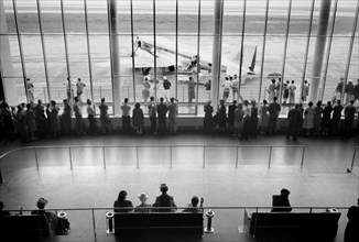 Visitors watching Airplanes from Waiting Area