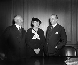 U.S. Secretary of Labor Frances Perkins (center)