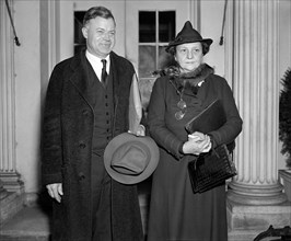 Warren Madden of the National Labor Relations Board and U.S. Secretary of Labor Frances Perkins leaving White House after discussing with U.S. President Franklin Roosevelt a Labor Dispute at Merrimac ...