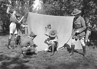 Boy Scouts of the American Red Cross Brigade putting up Tent at their Camp near Paris