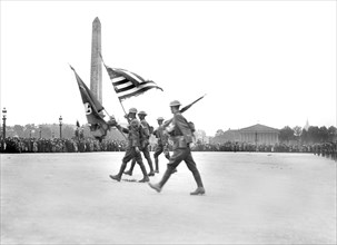 Color of 23rd Infantry Regiment leading detachment of American troops from the Chateau Thierry Front passing through Place de la Concord during 4th of July Parade