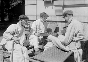 Patients enjoying Sun Bath and Game of Checkers in Garden of General Malterre's Hospital for mutilated Soldiers
